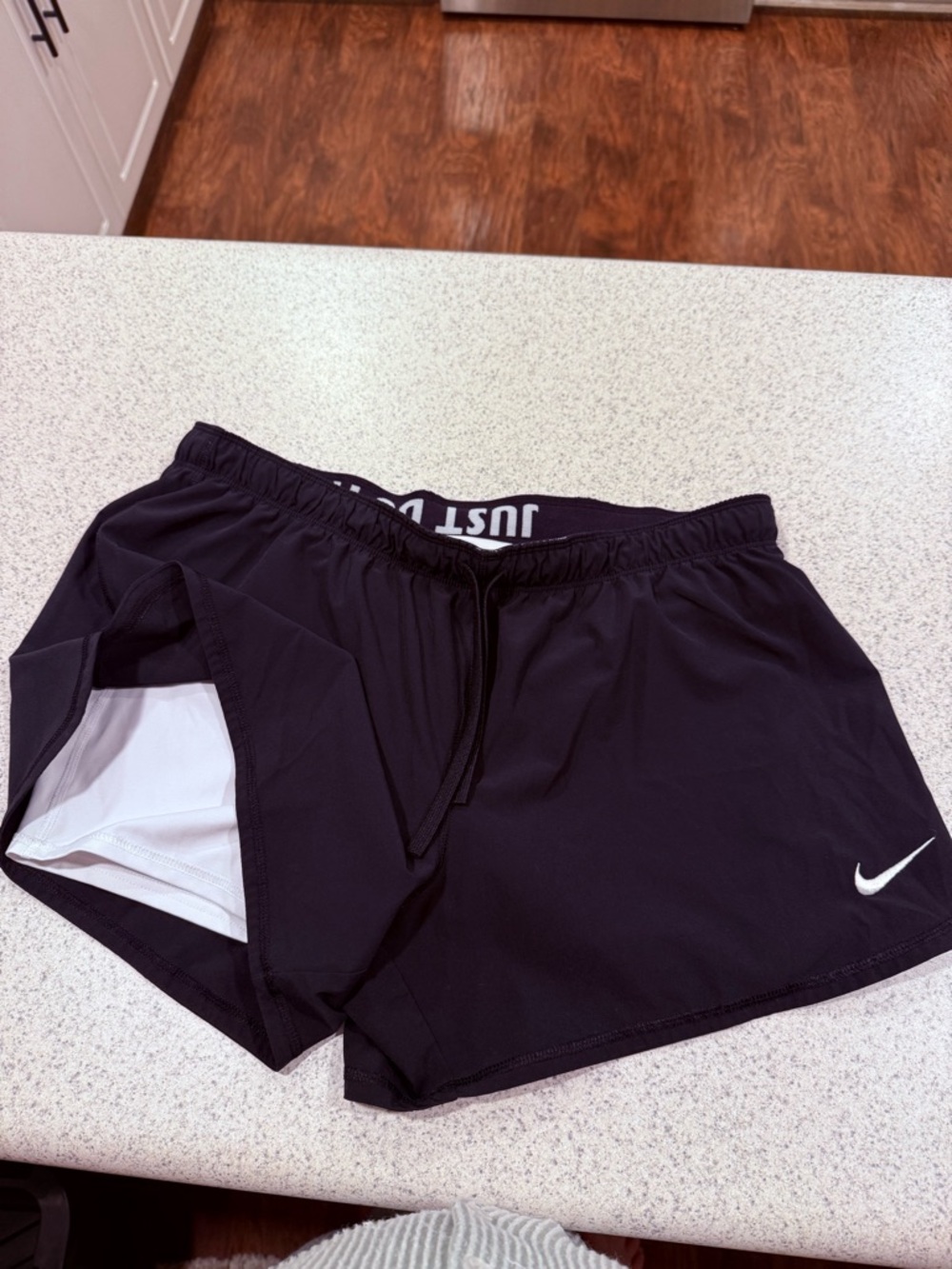 Nike Black Waistband Shorts with White Inner Liner and Swoosh